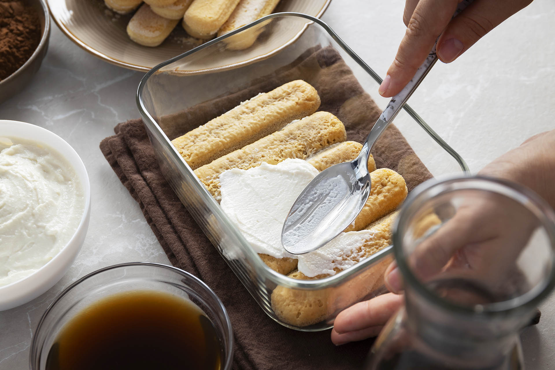 Tiramisu requires patience. To make the mascarpone cream with the right consistency and spread it carefully and evenly over the coffee-soaked savoiardi